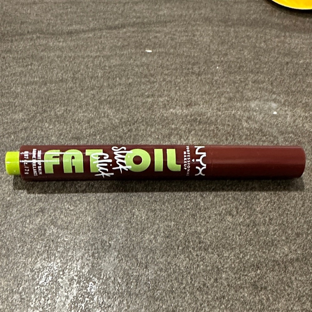 2 for $15 NYX Slip Tease Slick Oil Lip Tint in Deep Berry with Lime-Green Accent
